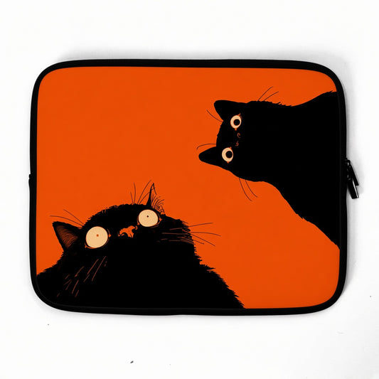 Two Black Cats on a Bright Orange Laptop Sleeve